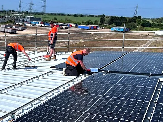 Fitting modules on a commercial metal roof